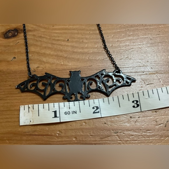 Gothic: metal bat necklace and two sets of dangle earrings biker core style too. - Picture 2 of 9